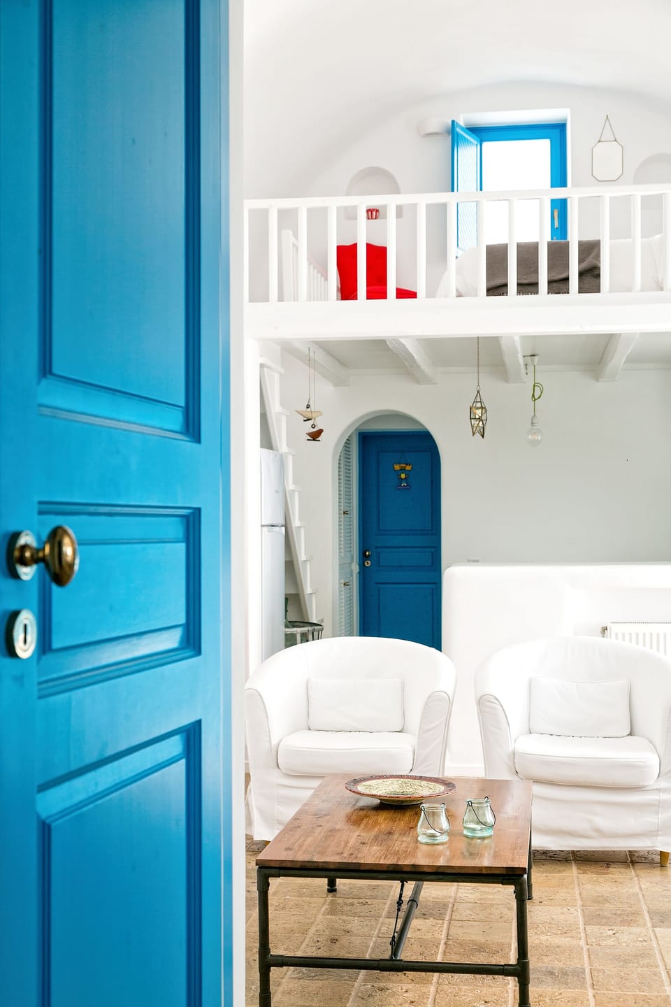 Living area and the loft style bedroom