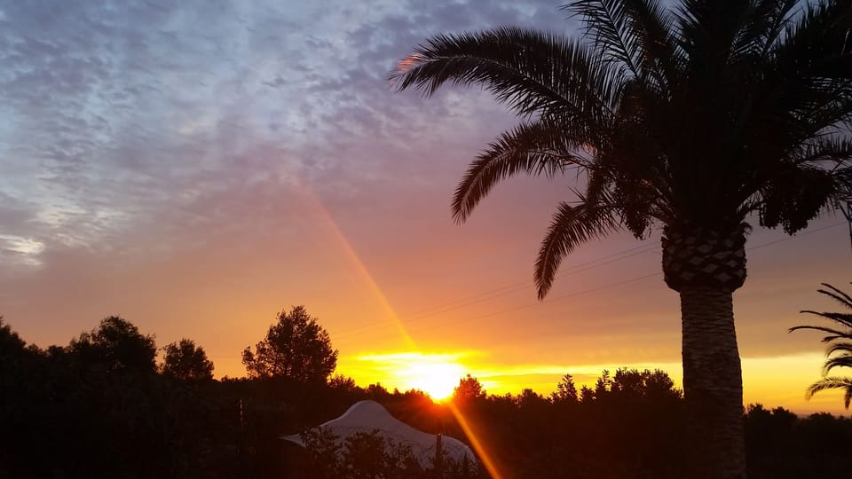 Sun rise over Cala Blanca (picture taken from covered terrace)