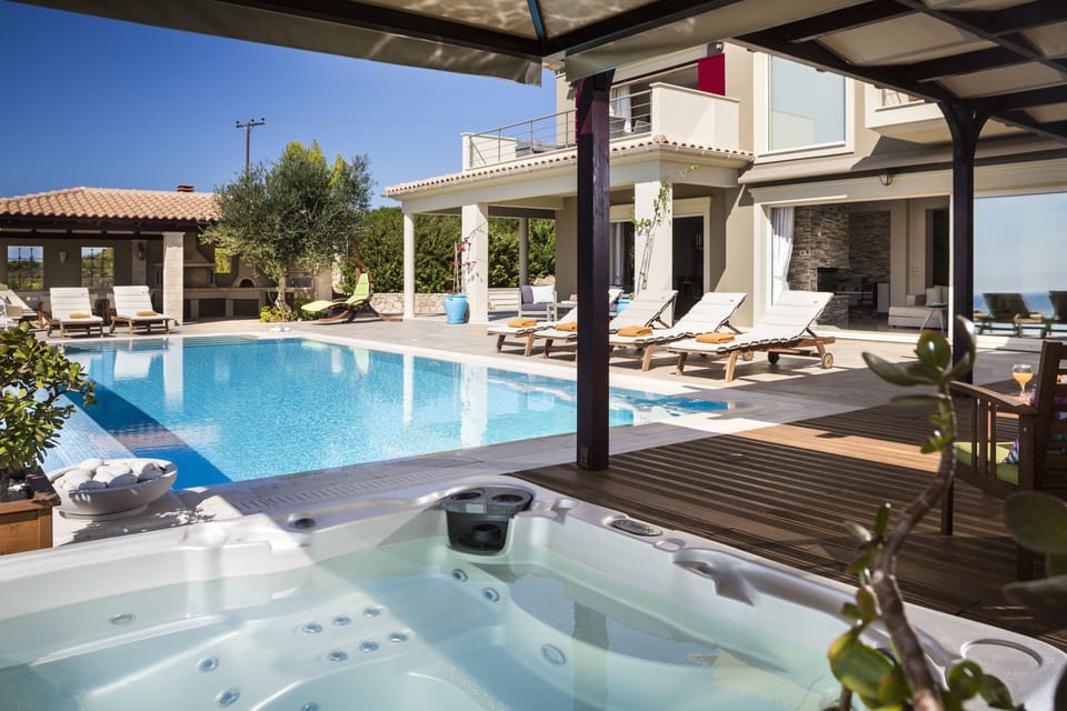 Pool area with lots of places to relax in or out of the sun.  