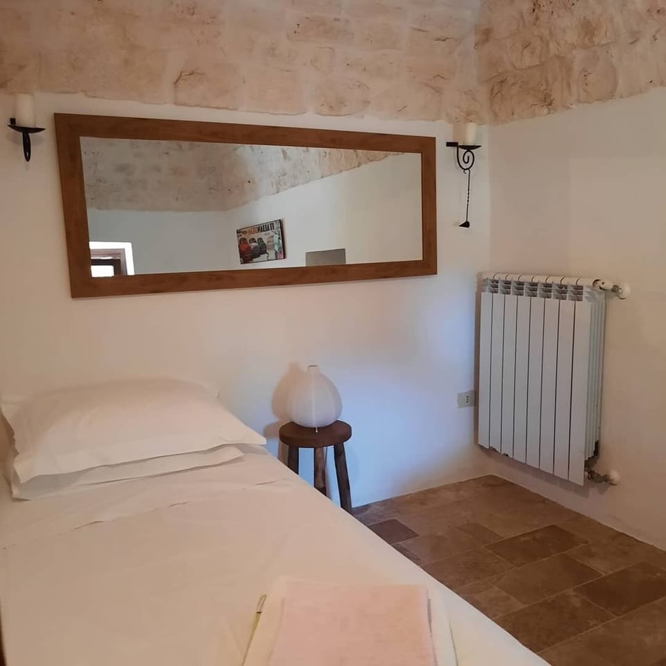 Second bedroom with stone vaulted ceiling