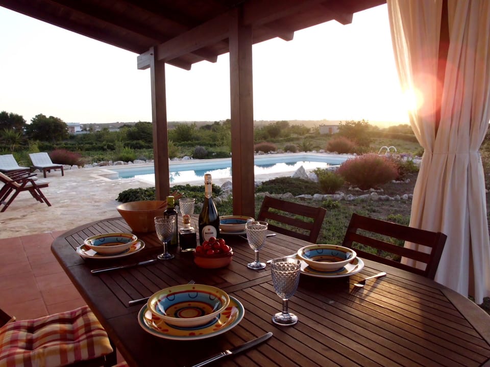 Verandah by the pool for shaded al-fresco dining