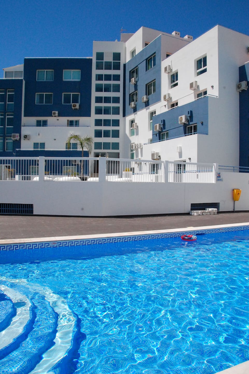 rear of building with pool