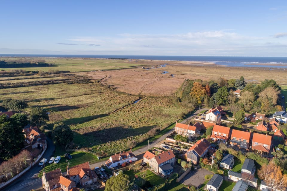 Ashdale Cottage, Thornham is set on a quiet village road overlooking the marsh