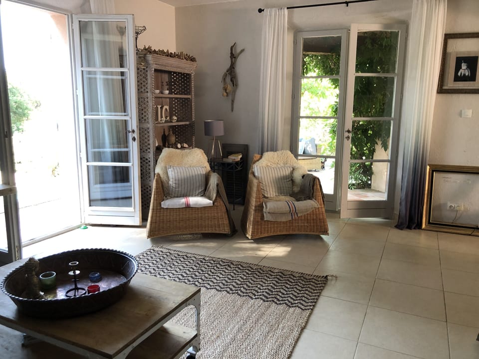 Another view of the sitting room.  The doors on the left lead down to the pool
