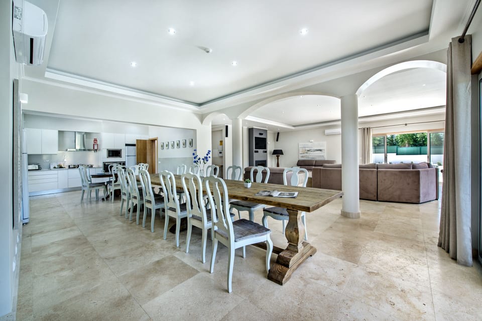 View of dining area with lounge in background 