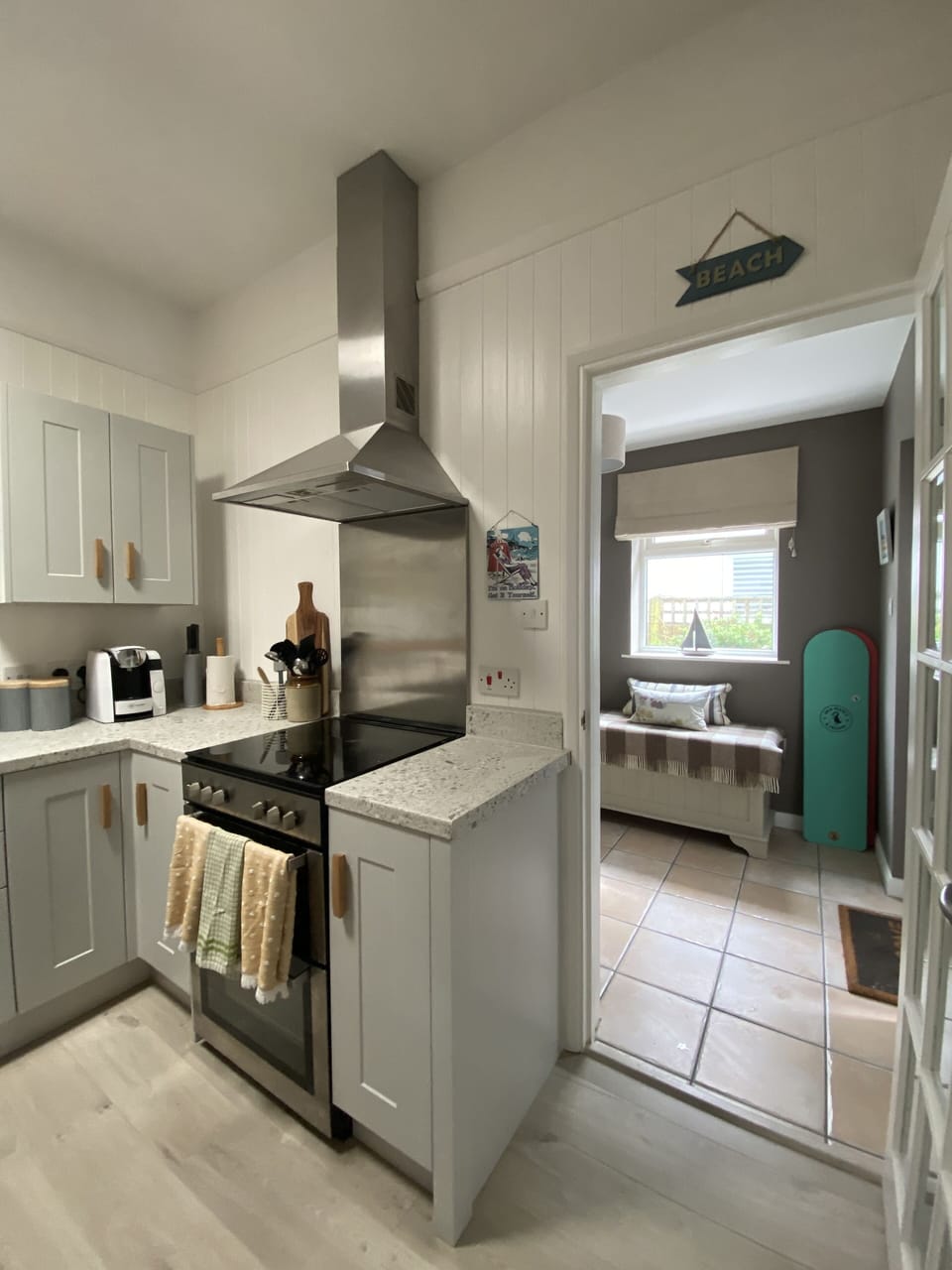 Cosy southern terrace, easy access to beach & private parking for several cars.