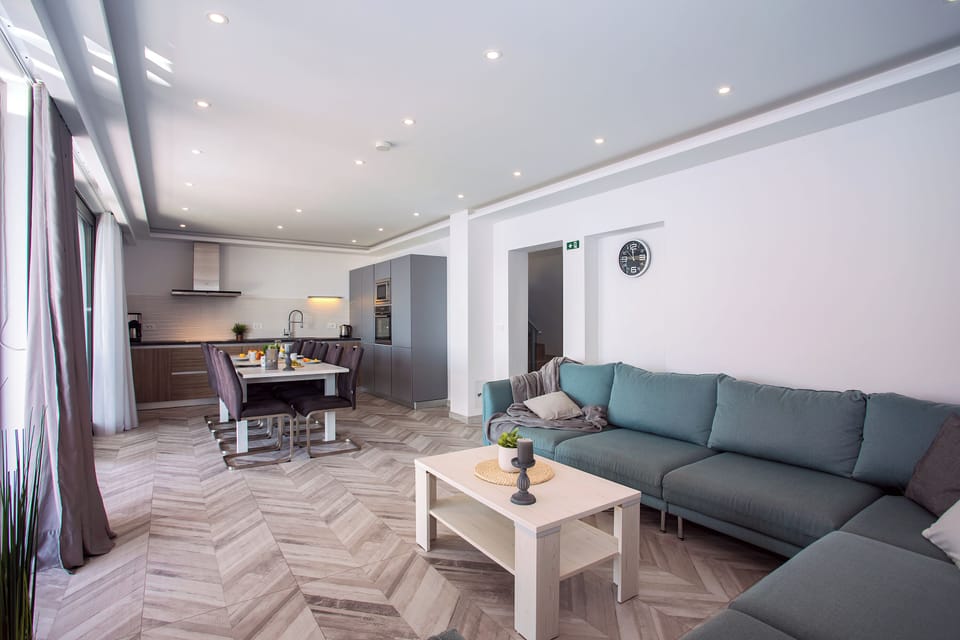 There is also a very comfortable and elegant couch, flat screen TV, free WiFi...