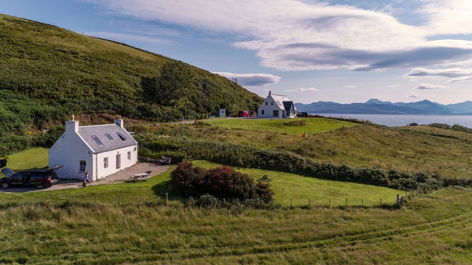 Cottage and view to cottage beyond and Knoydart