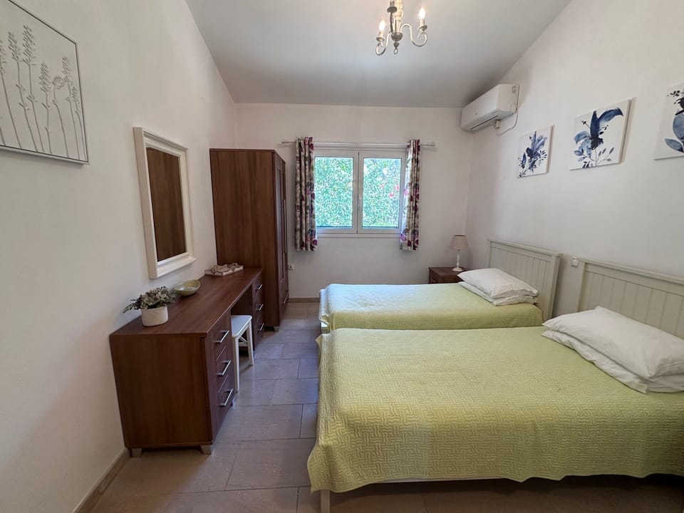 Bedroom 2.  Twin beds. Garden view