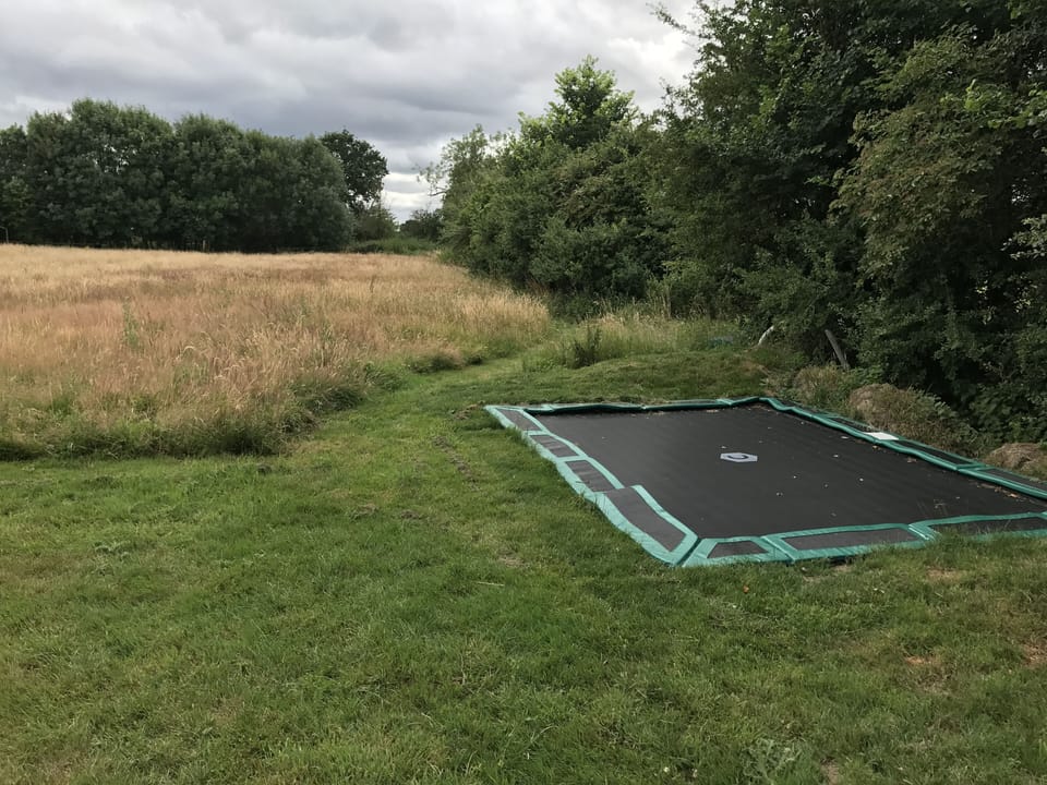 Large, new, in-ground trampoline