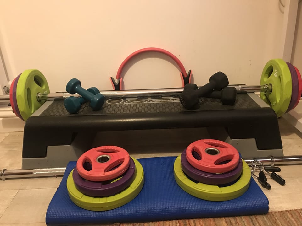 Weights, mat, Reebok Step in ‘Cinema Room’ with Les Mills On Demand ‘Body Pump’ 