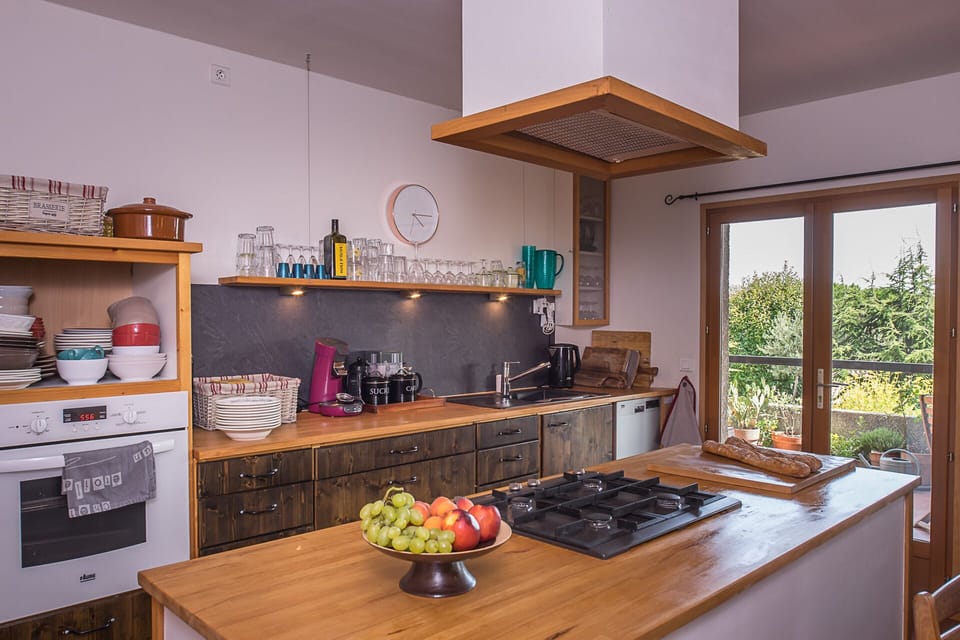 Open plan well equipped kitchen