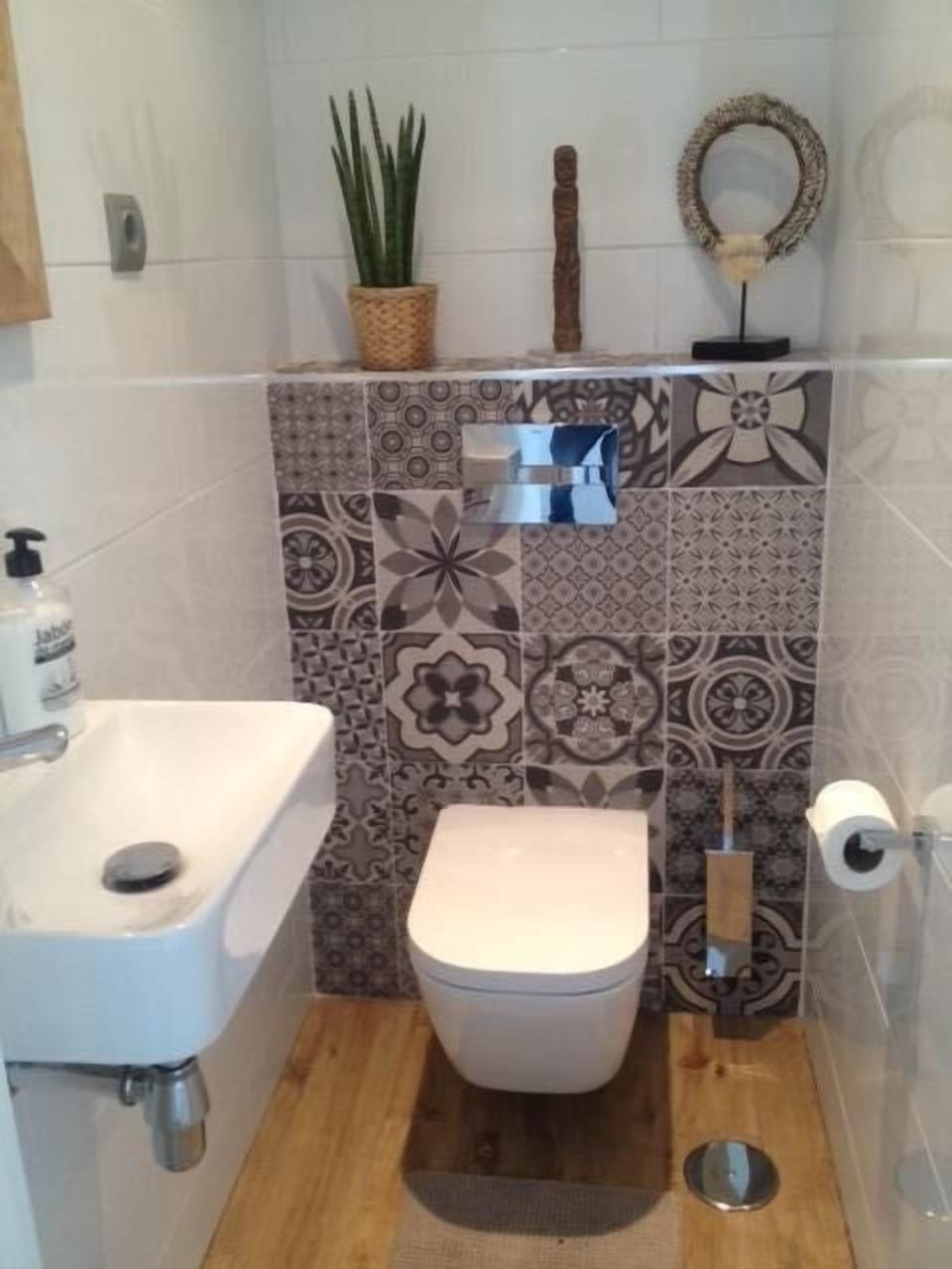 Bathroom with toilet and sink.
