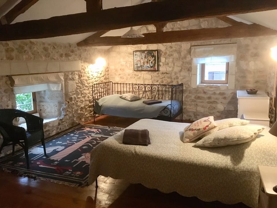 Upstairs bedroom in converted barn, double and full size day bed.