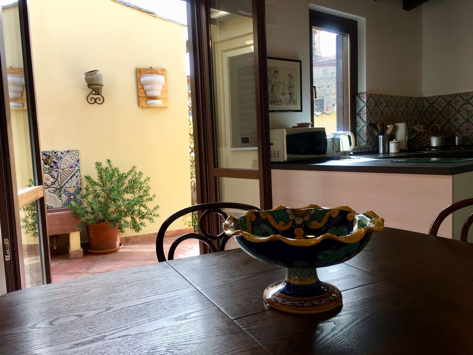 Kitchen with a  view of the terrace