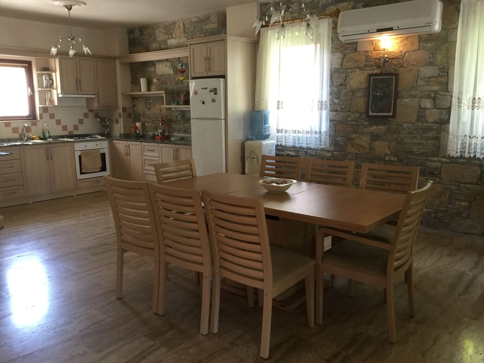 Dining area and kitchen with water cooler