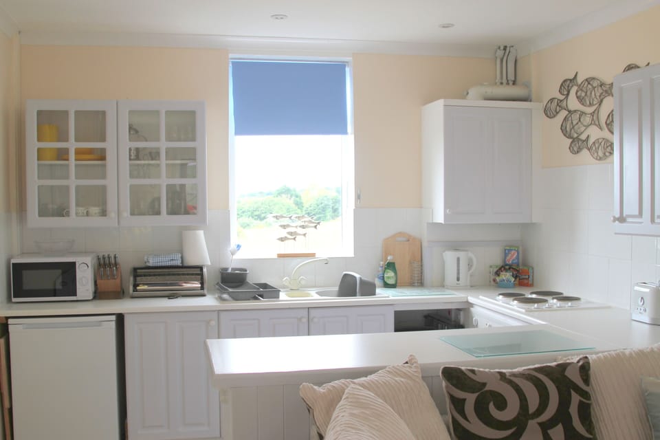 Bright and cheerful kitchen with everything you need for a comfortable stay