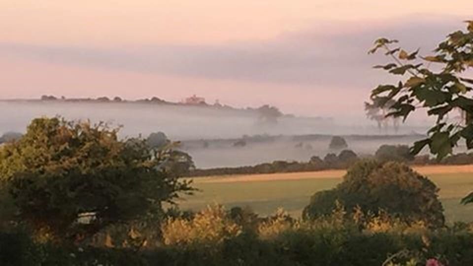 View from the bedroom window, St Michael's Mount through the early morning mist