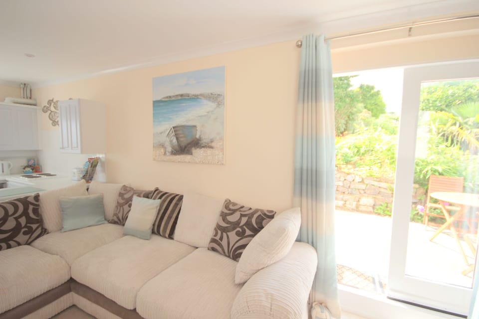 Access to private patio and outdoor dining area from the living area