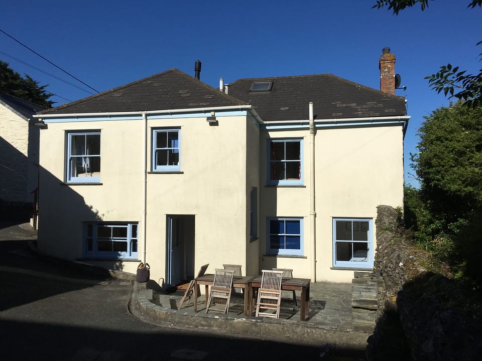 Farm Cottage has space in the yard to both play and park! 