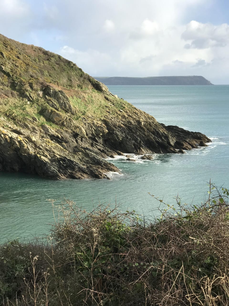 Portloe Harbour with Nare Head in the background 
