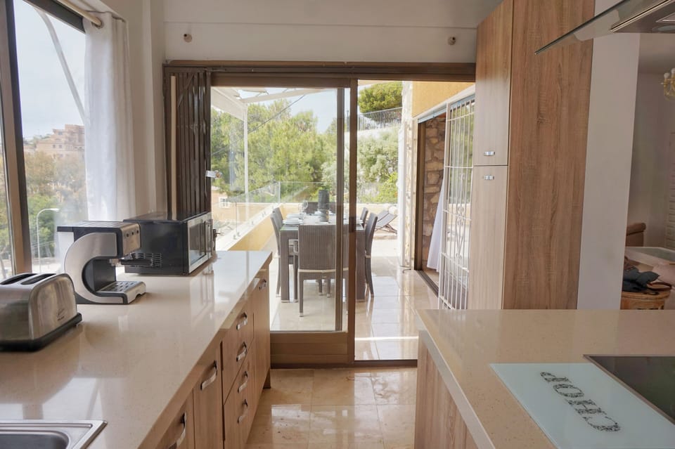Terrace next to the kitchen and livingroom with seaview