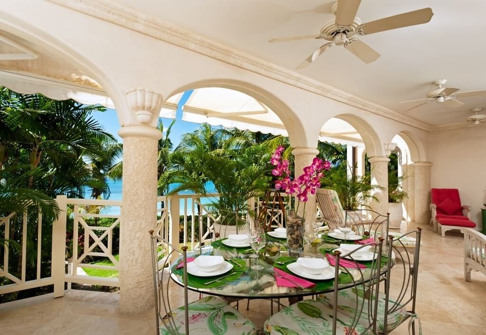 Dining on the Seaward Terrace, looking over the beach and gardens .  
