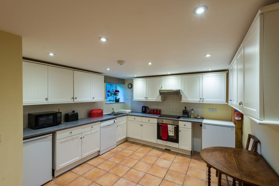 The spacious, modern kitchen has plenty of storage and counter space.