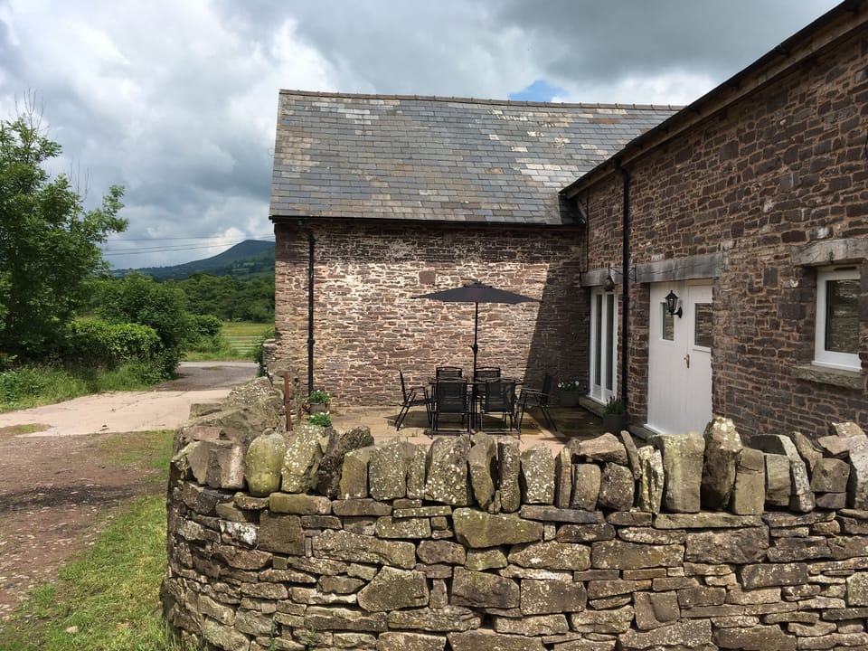 The Honeysuckle has private access from the road and its own parking space.