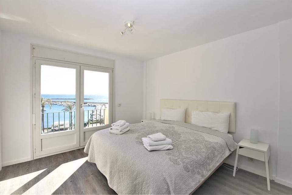 Master bedroom with super king size bed, en suite bathroom and private terrace