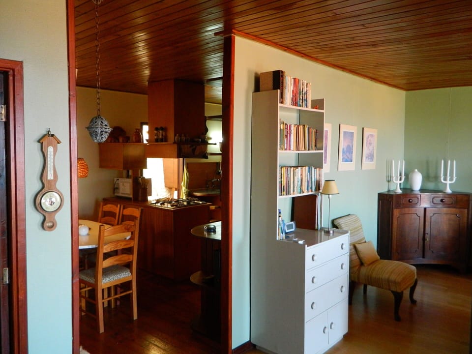 Dining area and kitchen seen from living room