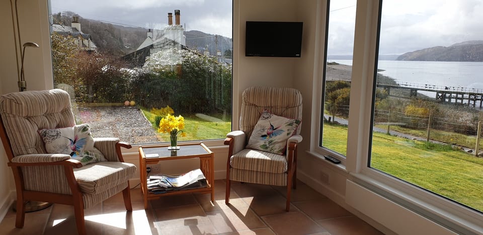 Sunroom looking across to Skye & down the sound of Sleat.