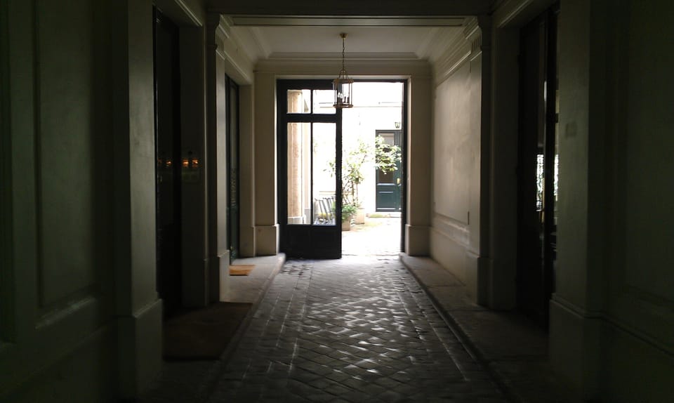 Entry to the building through the porte cochere