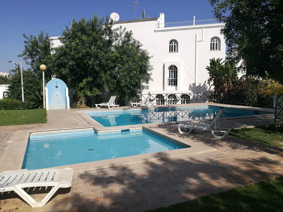 second pool situated next to apartment
