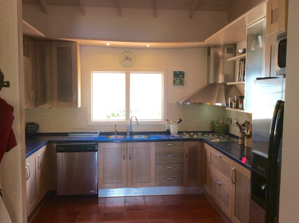 The photo makes the very well equipped kitchen look smaller than it is 