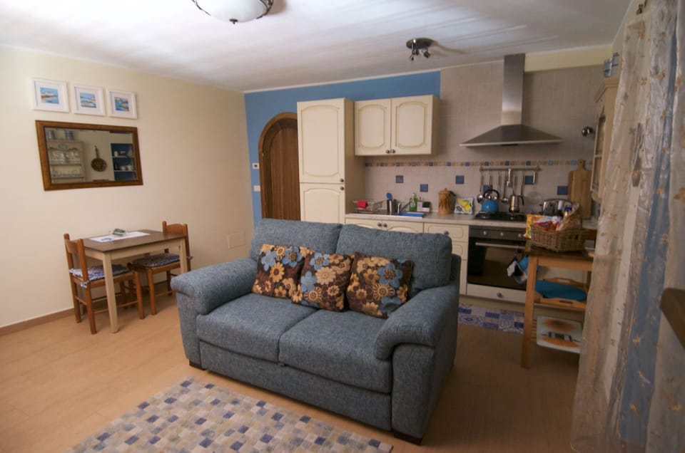 The open plan living area is a great space to unwind or escape the mid day sun.