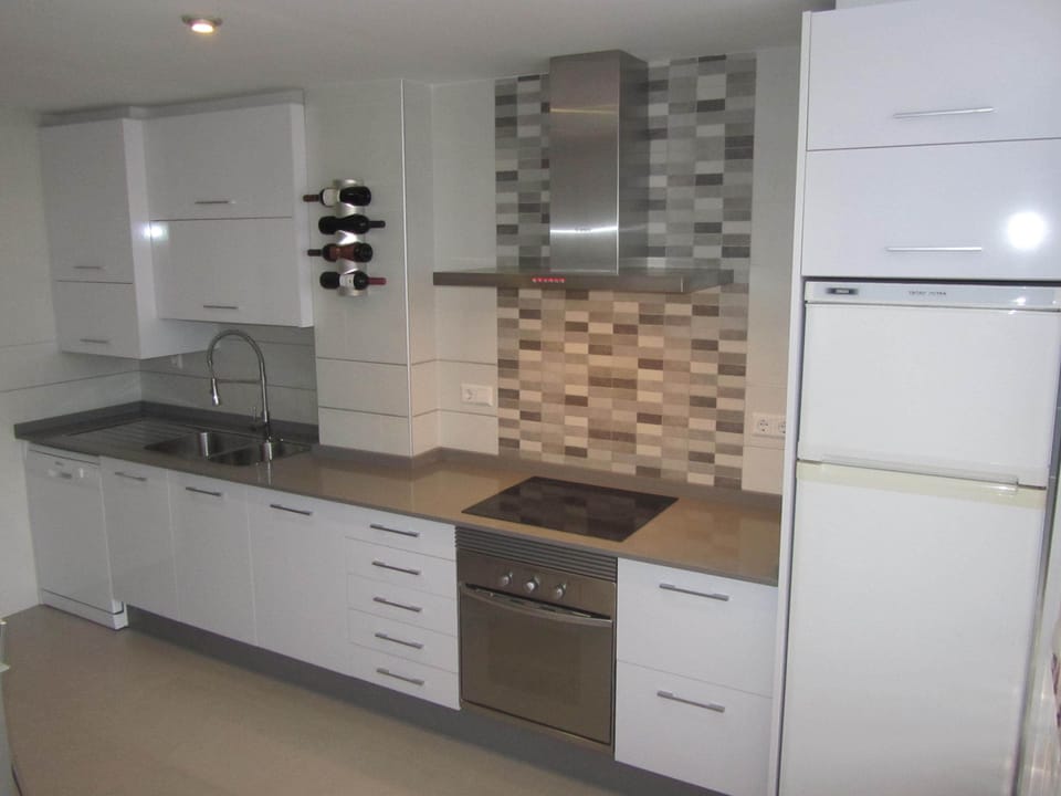 Very large kitchen with sea views, modern appliances,seating area & large larder