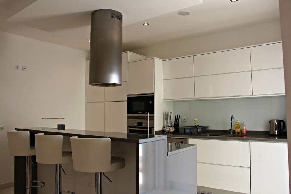 Bosch appliances include; microwave, induction hob, oven, grill, fridge, freezer