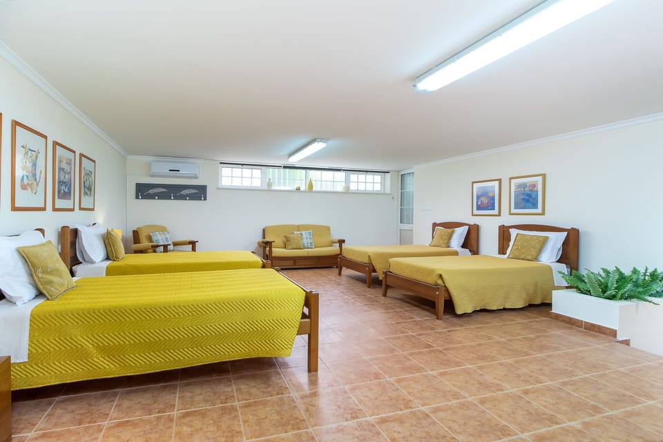 Room 7 with en-suite and 4 single beds