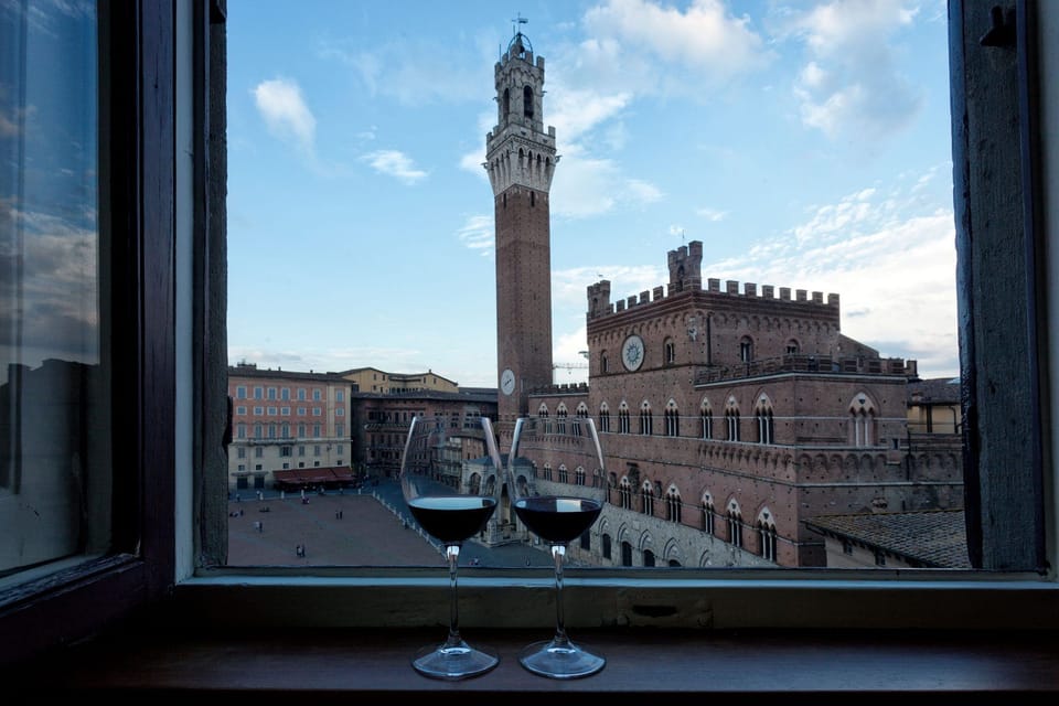 Sightsee of the Piazza del Campo, Siena from a window of the apartment
