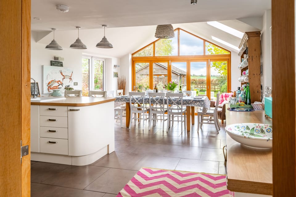 Ground floor: Dining area with bifold doors into the garden