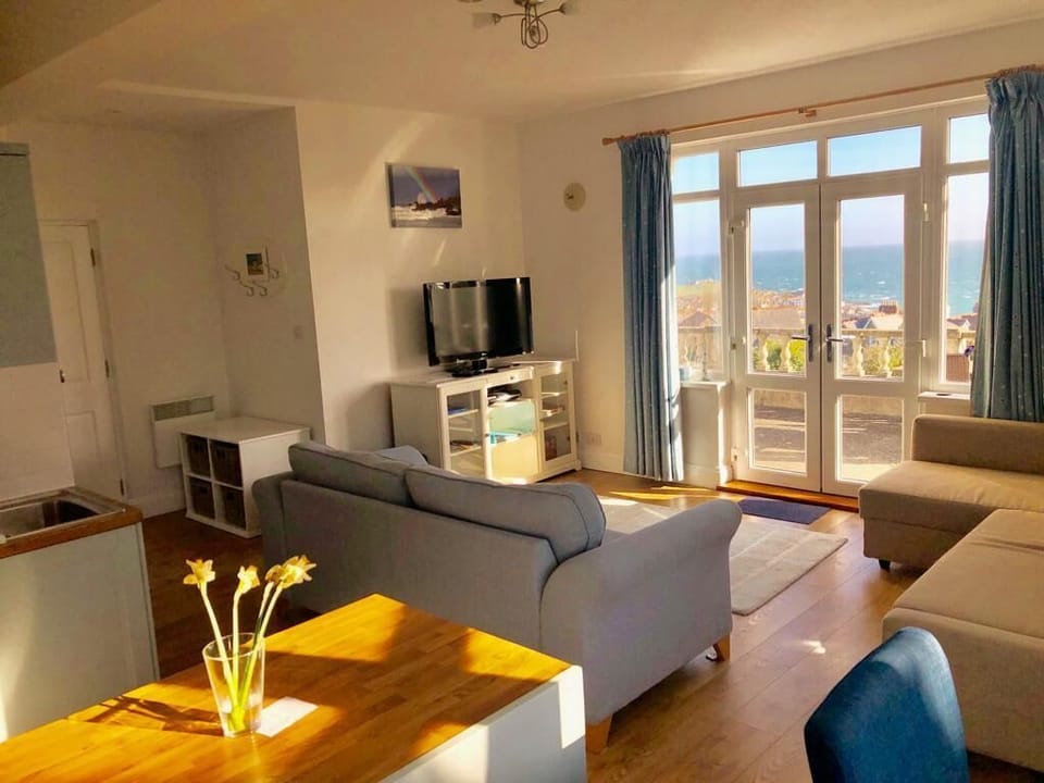 Lounge  with outstanding Views over St Ives opening onto Terrace