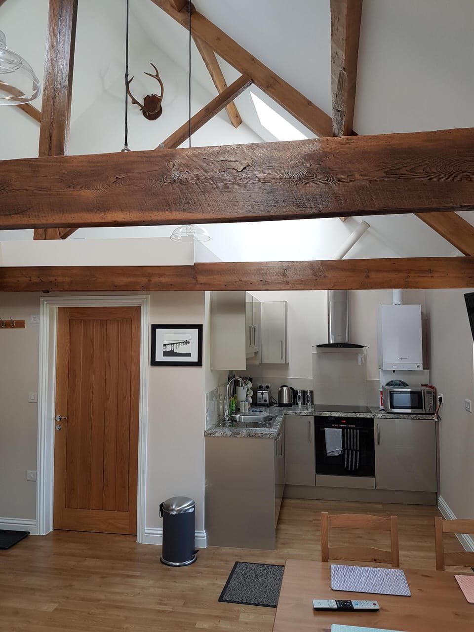 Fully equiped kitchen with vaulted roof and velux