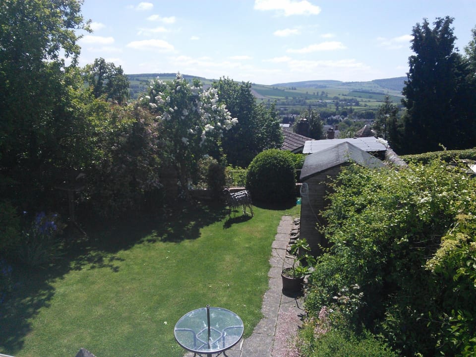 View of garden and Clun hills from bedroom 2