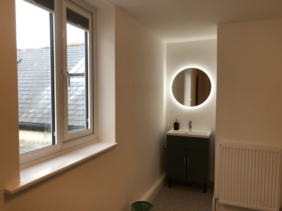 Bunk bedroom. Sink with touch mirror lighting.