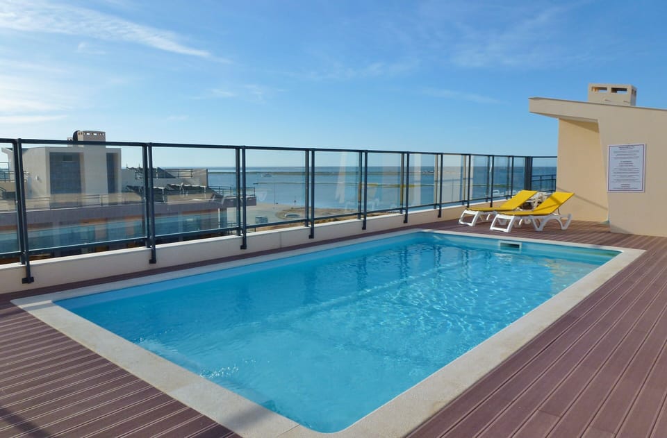 The rooftop pool is only one floor away