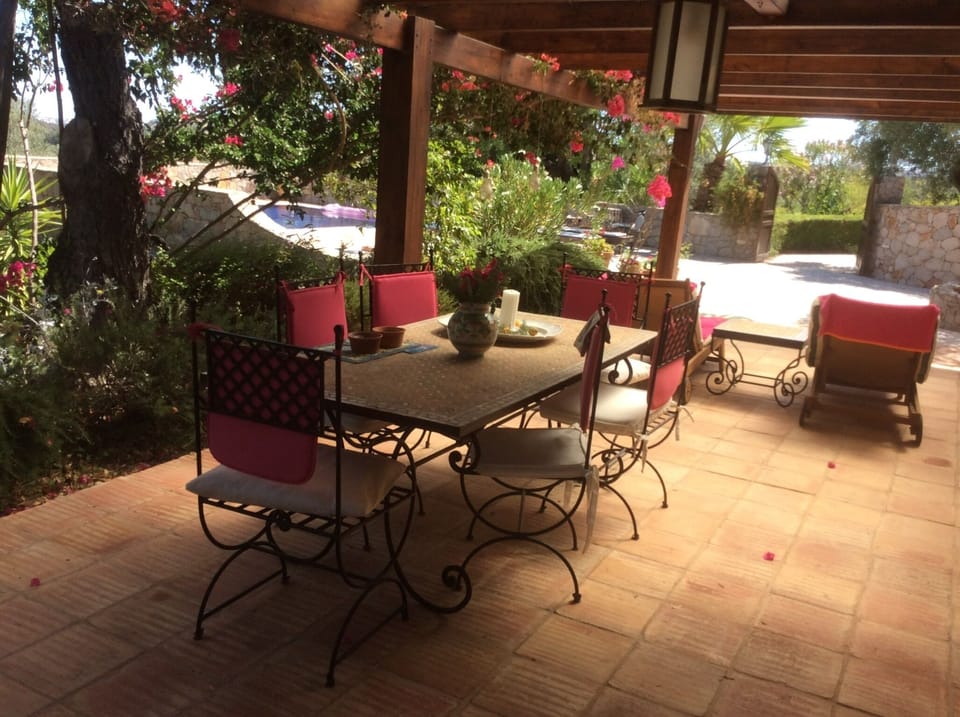 Patio with large table for outside meals with great views .
