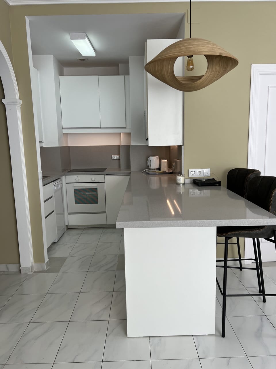 Open plan kitchen with large breakfast bar for entertaining 
