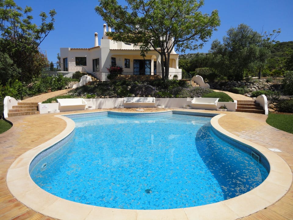 View of the villa from the south end of the pool