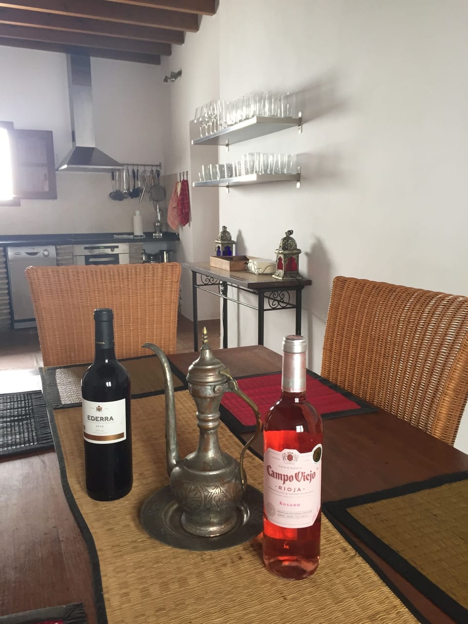 Dining table at the other end of the kitchen